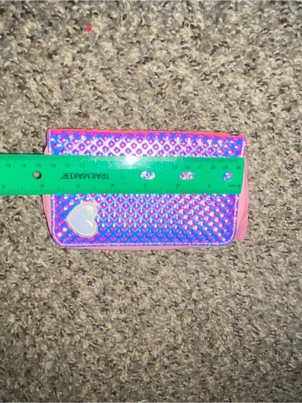 Pink heart embossed wristlet wallet